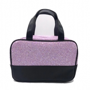 Glitter carries her makeup bag