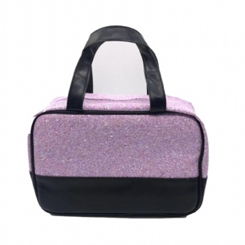 Glitter carries her makeup bag