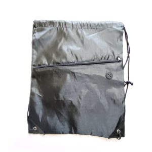 Black drawstring bag with black zipper pocket and reinforced corners