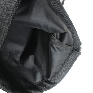 Inside view of black drawstring bag showing liner and stitched seam