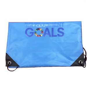 Flat lay of blue drawstring backpack showing black reinforced corners