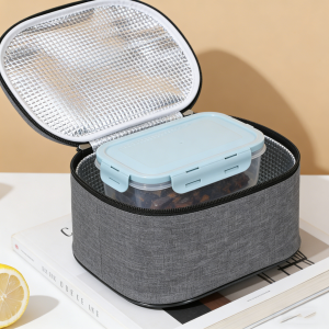 Close-up view of open grey lunch bag with thermal insulation liner