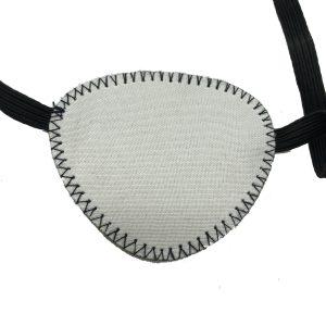 Close-up of zigzag overlock stitching on grey cotton-paper eye patch