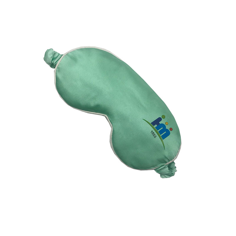 Side view of mint faux silk eye mask with ruched elastic strap