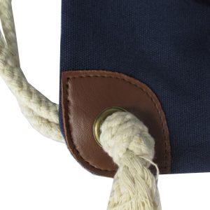 Brown leather reinforced corner patch with metal grommet and cotton rope knot