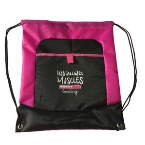 Vibrant pink drawstring bag with black front pocket