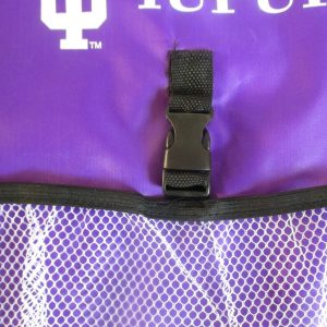 Black plastic center buckle detail on purple mesh pocket drawstring bag