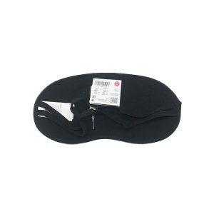 Back view of black sleep mask with elastic strap and custom hang tag