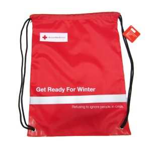 Red nylon drawstring bag with reflective strip and white logo print