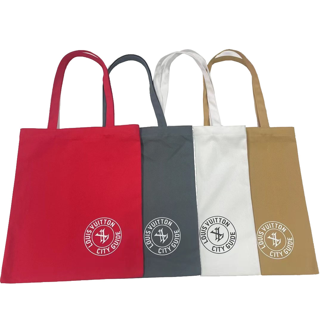 Four color canvas tote bags featuring red, black, khaki, and white with round custom logos