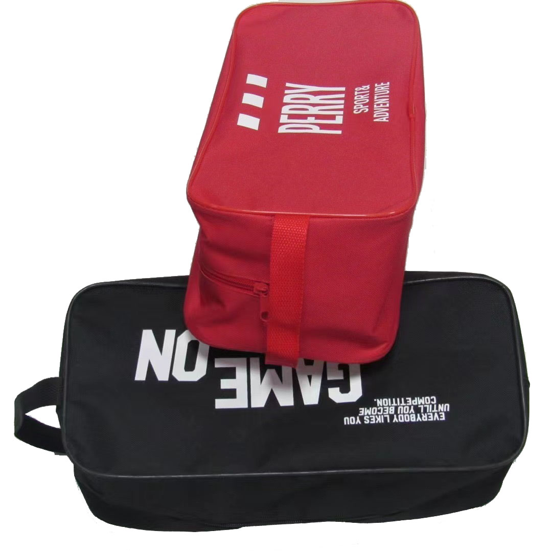 Black shoe bag with GAME ON text print and red bag stacked on top