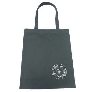 Black minimalist canvas tote bag with white circular logo printed on the bottom right