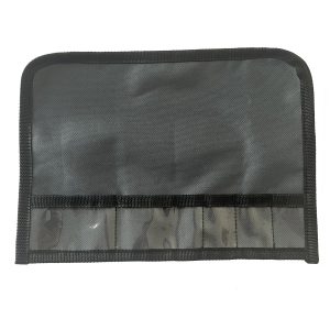 Black Oxford tool roll pouch flat lay with clear PVC elastic slots