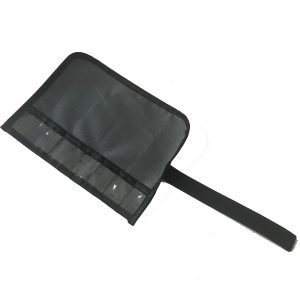 Black portable brush roll opened with Velcro strap extended outwards