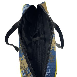 Interior mesh pocket and lining detail of camo fishing gear bag