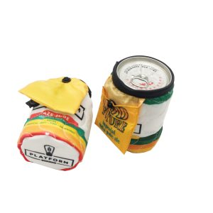 Foldable can cooler holding a beverage with black elastic rim and button flap