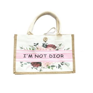 Canvas tote bag with pink stripe, floral print, and I'M NOT DIOR text