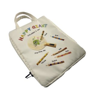 Angled view of cream kids gift bag with zipper closure and black pull tab