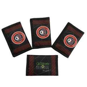 Set of custom branded tri-fold wallets with red stripes for sports promotions