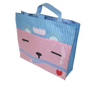 Angled view of blue and pink cartoon tote bag with top handles
