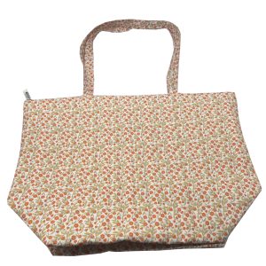 White floral cotton tote bag front view with matching woven handles