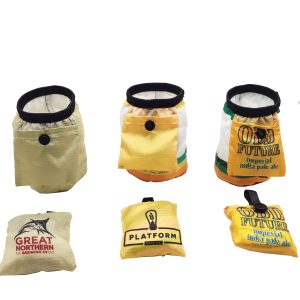 Compact folding can cooler pouch flat lay showing portability and different brand prints