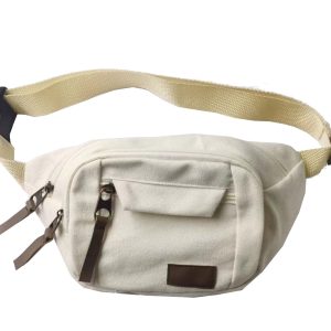 Heavyweight cream canvas waist bag front view with leather zipper pulls and leather patch