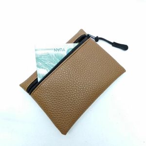 Khaki pebbled PU leather coin purse with black zipper and cash inside