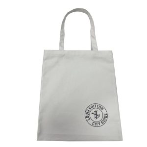 Light grey canvas tote bag with black circular logo print and thin handles