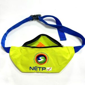 Neon yellow waist bag opened showing capacity with orange cube inside