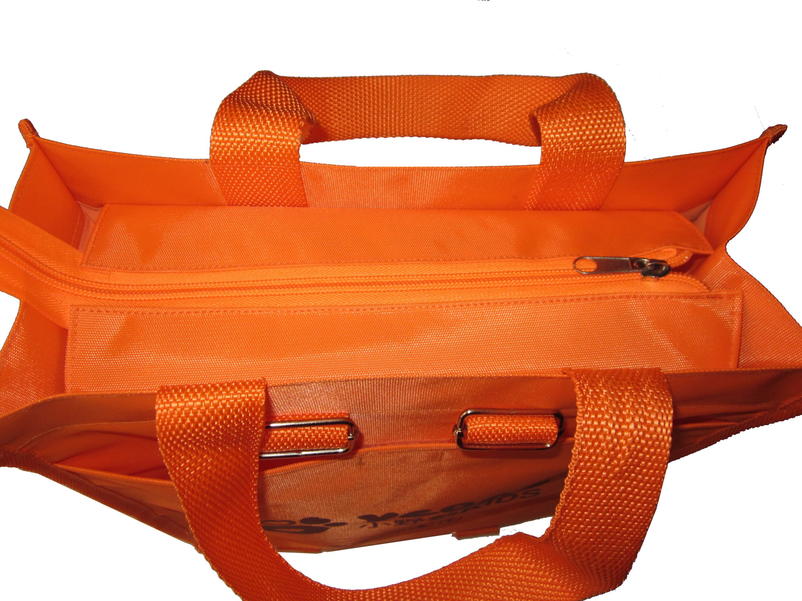 Orange tote bag top opening showing inner zipper closure and woven handle