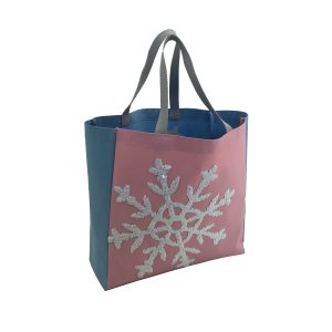 Pink and blue 600D Oxford tote bag angled view with sequin snowflake embroidery