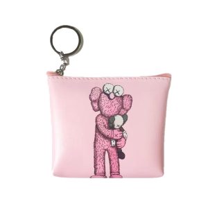 Pink PU leather keychain purse with pink KAWS hugging Companion graphic