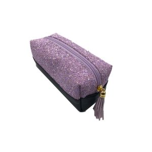 Purple glitter PU makeup pouch angled view with tassel zipper pull