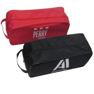 Angled view of red and black zipper pouches ideal for gym and travel