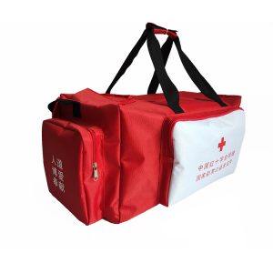 Red and white charity emergency relief duffel bag angled view