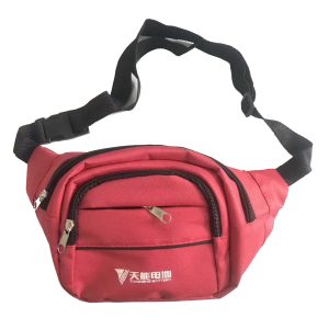 Red multi-pocket waist bag front view with black adjustable strap