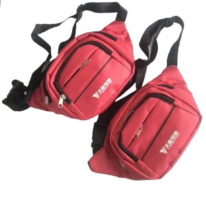 Two red multi-pocket fanny packs stacked together showing size and shape