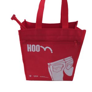 Red tote bag front view with white jeans graphic and HOOM logo