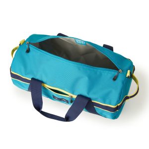 Open teal travel bag showing soft grey interior lining and inner labels