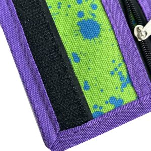 Black Velcro closure strip and purple woven edge binding on kids wallet