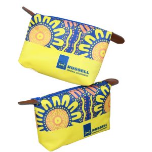 Stacked view of yellow bottom pouches with tribal sun and dot pattern prints