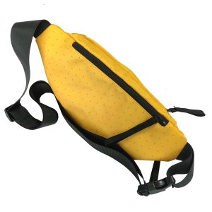 Back view of yellow dot texture waist bag with black adjustable strap