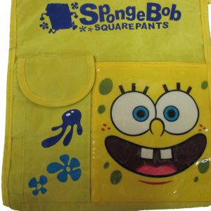 Close-up of clear PVC display pocket and Velcro flap pocket on yellow kids tote bag