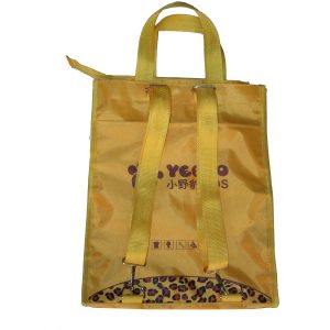 Yellow kids tote bag showing adjustable shoulder straps and metal D-rings